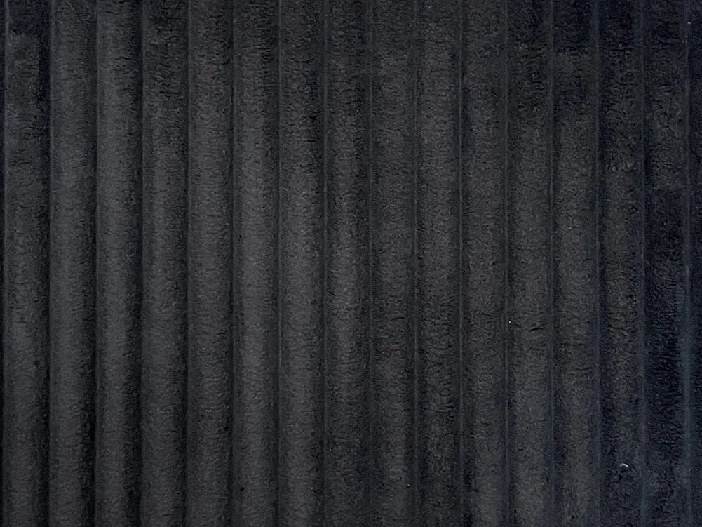 Black corduroy upholstery fabric texture